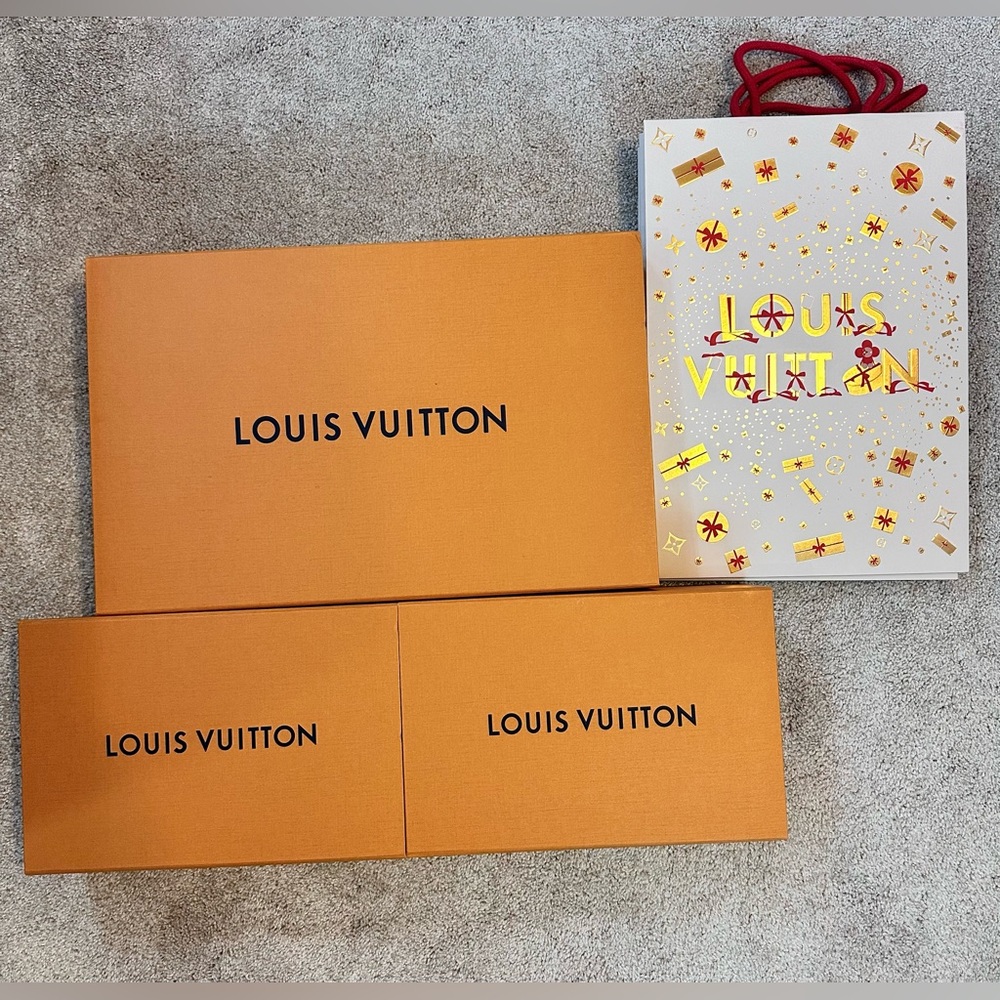 Louis Vuitton empty shopping bags(2) and boxes (3) $99